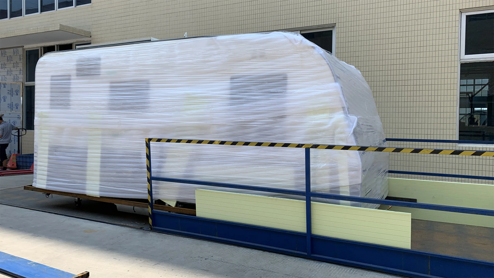 Ecocampor caravan wrapped for export shipping from China factory to Australian dealers