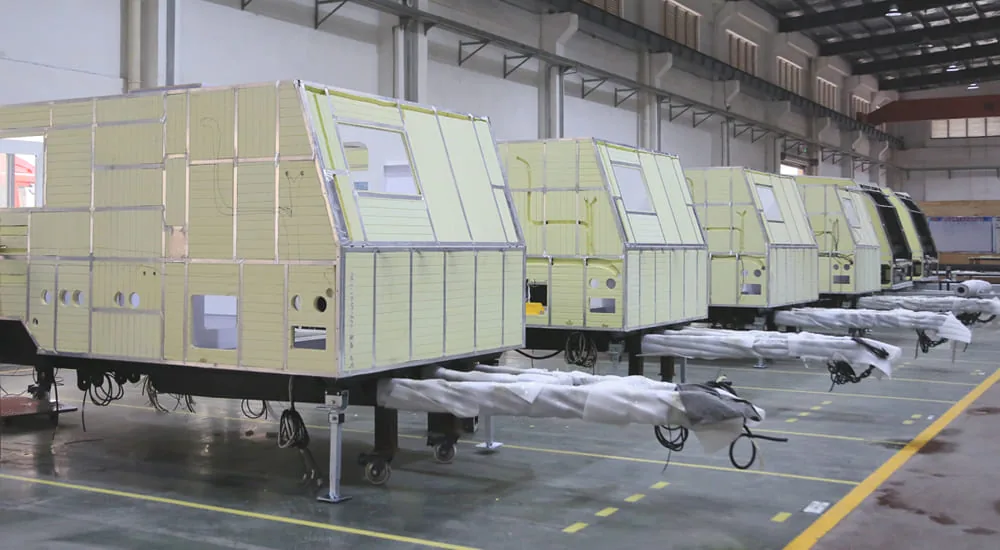 Ecocampor caravan production line — composite panel assembly at the China manufacturing facility